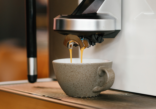Espresso ur en kaffemaskin
